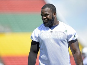 Toronto Argonauts defensive lineman Shawn Lemon, right, at a practice at Mosaic Stadium in Regina, Sask. on Sunday July 3, 2016.