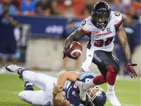 Tristan Jackson (right) returned a punt 75 yards for a touchdown in just second game with the Redblacks.