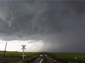 A nasty-looking thunderstorm passed by Regina to the south on Monday.

(REGINA, SASK  : July 15, 2013 --Storm photos from the weather watches and warnings in and around the Regina, SK area. on Monday, July 15, 2013. A wall of water and hail makes its way north near the 33 highway east of Richardson. BRYAN SCHLOSSER/Regina, Leader-Post.)