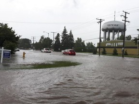 A flooded street in Estevan, Sask.