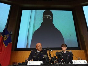 Royal Canadian Mounted Police (RCMP) Assistant Commissioner Mike Cabana and Assistant Commander for Ontario, Jennifer Strach speak during a press conference at the RCMP National Headquarters in Ottawa, Ontario August 11, 2016.