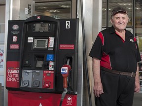 Dick Assman poses by a gas pump at a South Albert St. Petro-Canada gas station in Regina, Saskatchewan on Tuesday, May 19, 2015. The 81-year-old Saskatchewan gas jockey still has vivid memories of stepping out on David Letterman's stage.