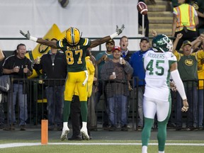 The Edmonton Eskimos' Derel Walker, 87, celebrates a touchdown against the Saskatchewan Roughriders during Friday's CFL game.