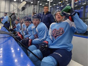 Forward Nick Henry, right, takes a breather during the Regina Pats' training camp.