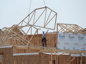 Construction workers build new homes in Ottawa. Concern has been expressed about Saskatchewan worksite safety.