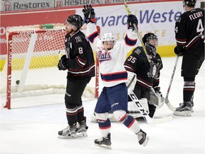 The Regina Pats' Riley Woods, shown celebrating a goal against the Red Deer Rebels during the 2016 WHL playoffs, hopes to light the lamp with more frequency during the season ahead.