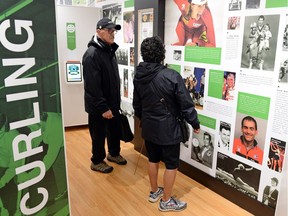 Nelson Kingston, left, and his wife Phyllis  tour the Saskatchewan Sports Hall of Fame's travelling exhibit at City Square Plaza on Wednesday.