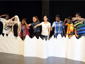 Kids rehearse for an upcoming performance while attending the Summer Spin Theatre Camp at the Globe Theatre in Regina on Friday.  The camp is run in partnership with the Regina Open Door Society.