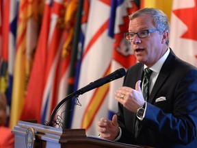 Saskatchewan Premier Brad Wall introduces a new provincial cabinet at Government House in Regina on Aug. 23, 2016.