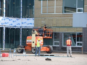 A P3 school under construction in Regina in August. The number of Employment Insurance recipients increased 19 per cent in June, the second-largest year-over- year percentage increase among the provinces, behind Alberta.