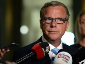 Premier Brad Wall speaks to reporters at the Legislative Building Monday about Don McMorris's resignation from cabinet and caucus after being charged with impaired driving.