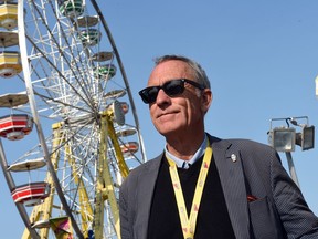 Scooter (Greg) Korek with North American Midway Entertainment on the midway at the Queen City Exhibition grounds in Regina.