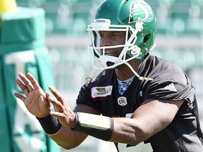 Saskatchewan Roughriders quarterback Darian Durant prepares to accept a snap during practice on Tuesday.