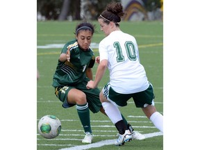 Shayla Kapila (left), shown above in a file photo, helped the University of Regina Cougars women's soccer team win their pre-season opener on Friday.
