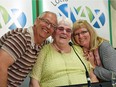 Mary Wernicke (C) of Neville, Sask. with her son, Fred Wernicke (L) and daughter Julie Welk (R). In August, Mary won $60-million in the lottery, the largest in the province's history.