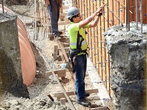 Unlike this worker, very few construction workers are wearing protective headgear on the job site according to WorkSafe Saskatchewan.