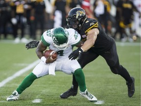 Saskatchewan Roughriders quarterback Darian Durant is sacked by former teammate John Chick on Saturday, when the Hamilton Tiger-Cats administered a 53-7 beatdown.