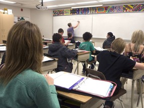 A Grade 8 classroom is shown in Martensville. It's been suggested Saskatchewan combine public and separate schools into a single system to save money and end duplication of services.