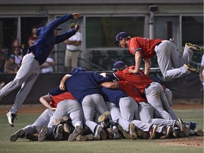 Swift Current Indians celebrate after winning the Western Major Baseball League title Saturday night in Edmonton.