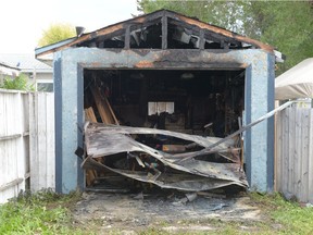 A burned-out garage sits at 2144 MacKay St. in Regina, Sask. on Saturday Sept. 3, 2016. Neighbours said the fire happened in the early hours of the morning.