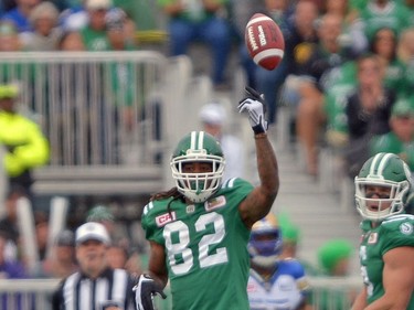 Naaman Roosevelt #82 of the Saskatchewan Roughriders tosses the ball after a successful play during the Labour Day Classic held at Mosaic Stadium in Regina, Sask. on Sunday Sept. 4, 2016.