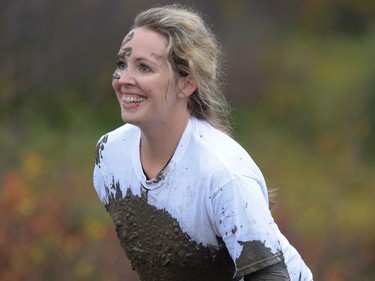 People participate in Mud, Sweet & Tears in Lumsden, Sask. on Saturday Sept. 24, 2016.