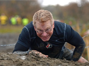 People participate in Mud, Sweet & Tears in Lumsden, Sask. on Saturday Sept. 24, 2016.