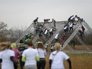 People participate in Mud, Sweet & Tears in Lumsden, Sask. on Saturday Sept. 24, 2016.