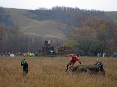 People participate in Mud, Sweet & Tears in Lumsden, Sask. on Saturday