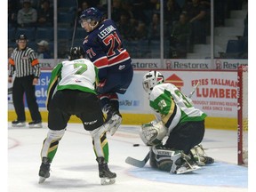 Regina Pats forward Dawson Leedahl screens Prince Albert Raiders goalie Ian Scott, leading to a second-period goal in WHL action at the Brandt Centre on Friday.