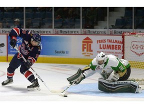 Regina Pats forward Jake Leschyshyn, left, shown during Friday's regular-season opener against the Prince Albert Raiders, had two goals and an assist Saturday as the Pats doubled Prince Albert 4-2.