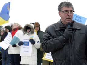 Ken Krawetz speaks with members of Local Ukrainian groups took to the steps of the Legislature in December of 2013 to show support for the people involved in the upheaval in Ukraine.