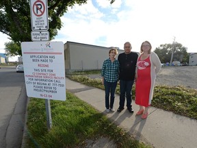 Carol Strelesky, from left, and her husband Rene along with local resident Patty Will stand on the proposed site of a new Souls Harbour Rescue Mission building in Regina. They along with others object to the plan.