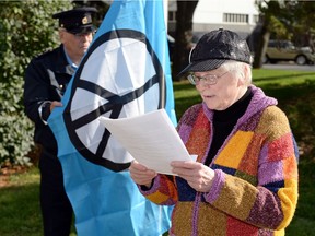 Florence Stratton, a member of PeaceQuest Regina, speaks at the raising of a peace flag flies at Regina City Hall to mark the United Nations International of Peace, also known as World Peace Day.in Regina.