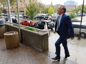 Former Saskatchewan Party cabinet minister Don McMorris arrives at Regina Provincial Court on Sept. 7 to plead guilty to driving while over the legal limit.