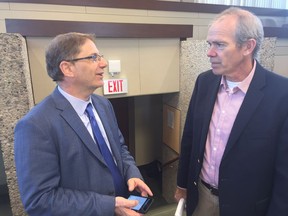 Ed Greenspon, president and CEO of the Public Policy Forum, (left) and Bob Cox, publisher of the Winnipeg Free Press, chat following the PPF's roundtable discussion at the University of Regina on Tuesday.