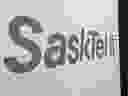 SaskTel logo projected on a display screen during the presentation of the Crown corporation's annual report in the summer of 2016. 