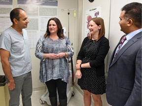 Dr. Kunal Goyal, head of medical imaging at Regina General Hospital, RN (NP) Shelley Giebel, patient Devaney Mehl from Estevan, Dr. Bhanu Prasad, kidney specialist talking about Mehl's renal denervation procedure at the Regina General Hospital.