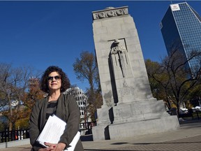 Jackie Schmidt from Heritage Regina in front of the Cenotaph at Victoria Park in Regina.  The Downtown Regina Cultural Trailway is a new walking tour of the Downtown Core that highlights thirteen important events, buildings, and people that have shaped our city, province, and country.