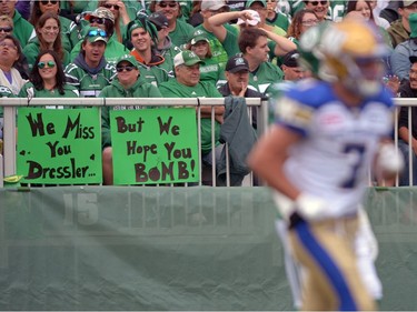 Saskatchewan Roughriders fans with a message for Weston Dressler #7 of the Winnipeg Blue Bombers during the Labour Day Classic held at Mosaic Stadium in Regina, Sask. on Sunday Sept. 4, 2016.