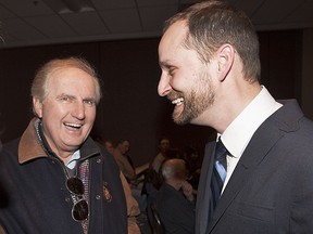 NDP old and new: Former premier Roy Romanow shares a laugh with Ryan Meili during the 2013 leadership convention. Meili didn't win then, but could be back for the upcoming race.