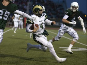 University of Regina Rams quarterback Noah Picton rushes for some of the 108 yards he gained Friday against the host Saskatchewan Huskies.