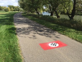Someone spray-painted a swastika on the pathway in Les Sherman Park in Regina.