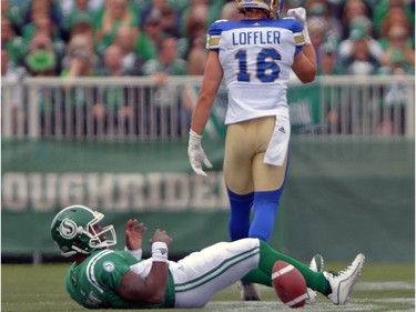 Taylor Loffler #16 of the Winnipeg Blue Bombers pumps his fist after sacking Darian Durant #4 of the Saskatchewan Roughriders during the Labour Day Classic held at Mosaic Stadium in Regina, Sask. on Sunday Sept. 4, 2016.