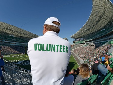 A volunteer stands at the new Mosaic Stadium test event featuring the University of Regina Rams vs. the University of Saskatchewan Huskies in Regina, Sask. on Saturday Oct. 1, 2016.