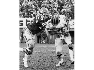 Roughriders defensive lineman Bill Baker makes a tackle against B.C. in 1977.