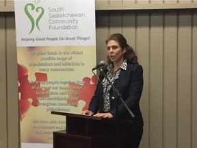 Christina Attard, executive director of the South Saskatchewan Community Foundation, speaks at the launch of the 2016 Vital Signs Report for the Regina area on Tuesday at the Regina Food Bank. PHOTO ASHLEY ROBINSON