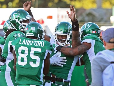 Darian Durant #4 of the Saskatchewan Roughriders celebrates a victory over the Edmonton Eskimos during a game held at Mosaic Stadium in Regina, Sask. on Sunday Sept. 18, 2016.