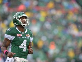 Roughriders quarterback Darian Durant looks at the replay screen on a rainy Saturday afternoon at Mosaic Stadium.