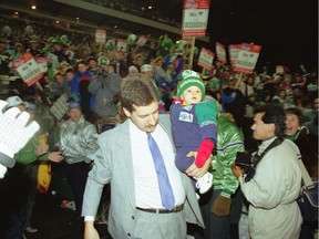 Dave Ridgway and his 14-month-old son, Christopher, at Taylor Field after the Saskatchewan Roughriders' 1989 Grey Cup victory.